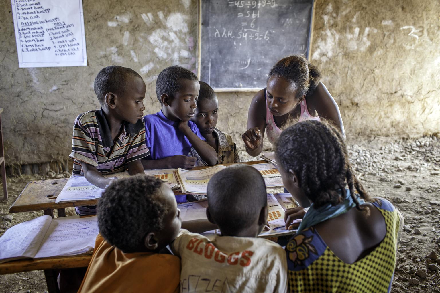 Yeglime Mebrtu, helps pupils at Alula ABEC (Alternative Basic Education Center) - presently upgraded as a primary school, in Afar region of Ethiopia Tuesday 8 April, 2014.
Pastorlist in Afar and Oromia region of Ethiopia, Alternative Basic Education Center